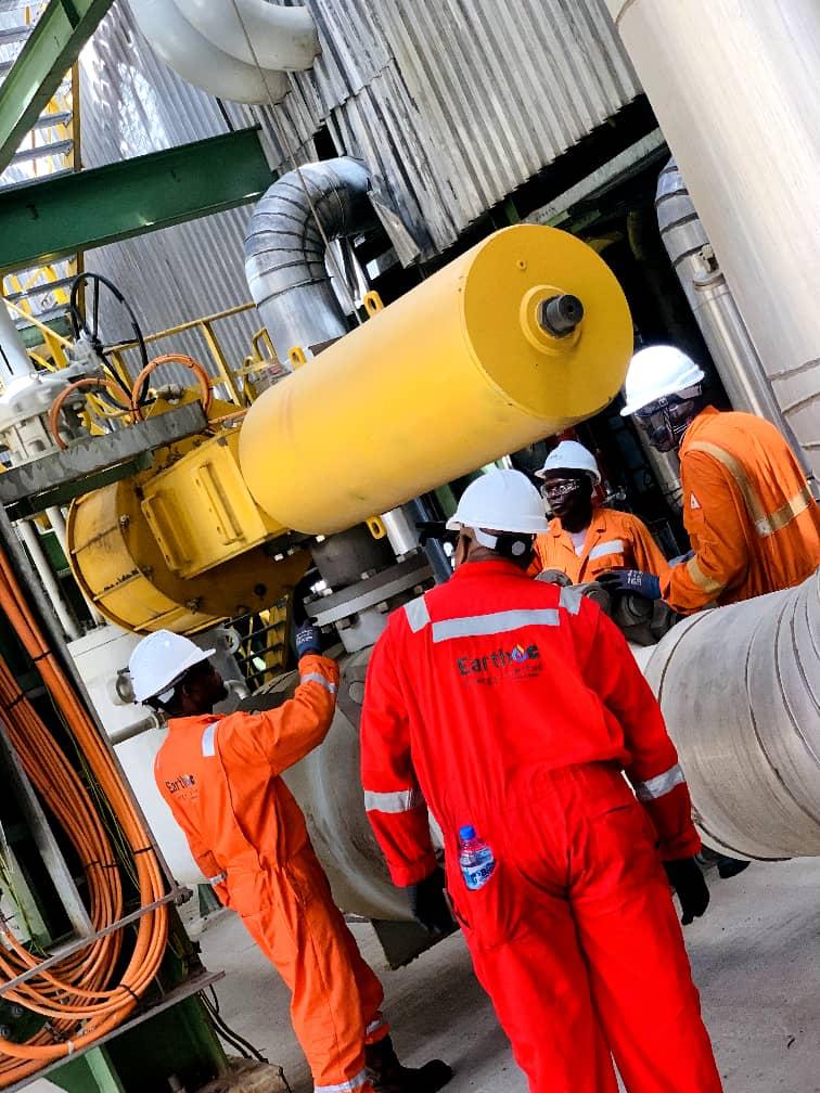 Earthoc trainees working with industrial equipment